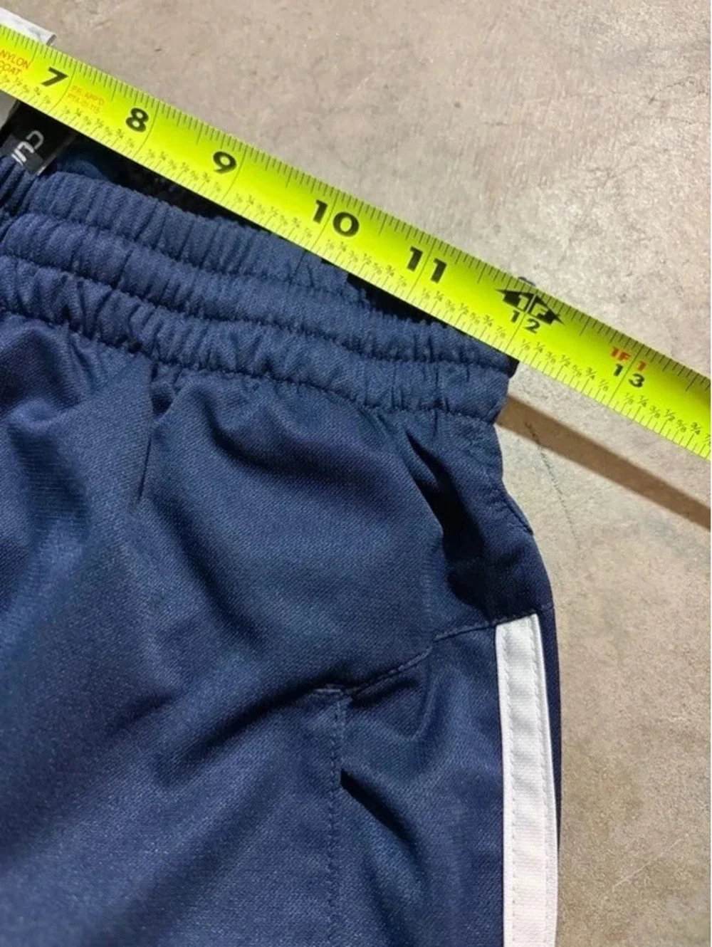 Y2K vintage blue and white striped adidas track pants with zipper on ankle